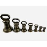 Set of seven Avoir bronze bell proof weights
