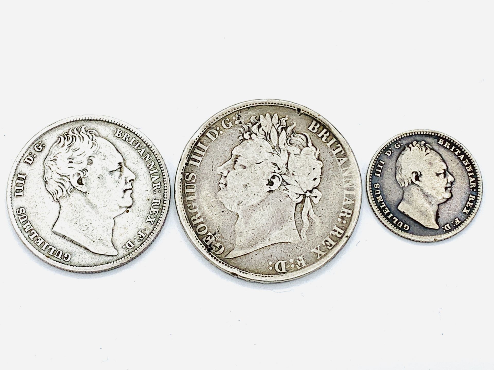 George IV Crown 1822, a William IV half crown 1837 and a William IV shilling 1834