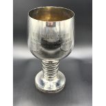 A tall sterling silver goblet
