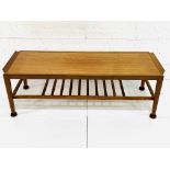 Teak coffee table with newspaper rack under