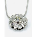 18ct white gold and diamond pendant in the form of a flower on 18ct white gold chain