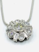 18ct white gold and diamond pendant in the form of a flower on 18ct white gold chain