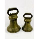 Two Avoir brass alloy bell proof weights: 56lbs and 28lbs