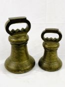 Two Avoir brass alloy bell proof weights: 56lbs and 28lbs