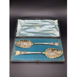 A pair of George III silver gilt berry spoons