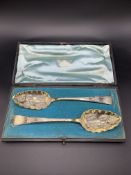 A pair of George III silver gilt berry spoons