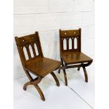 Shoolbred & Co. pair of oak hall chairs