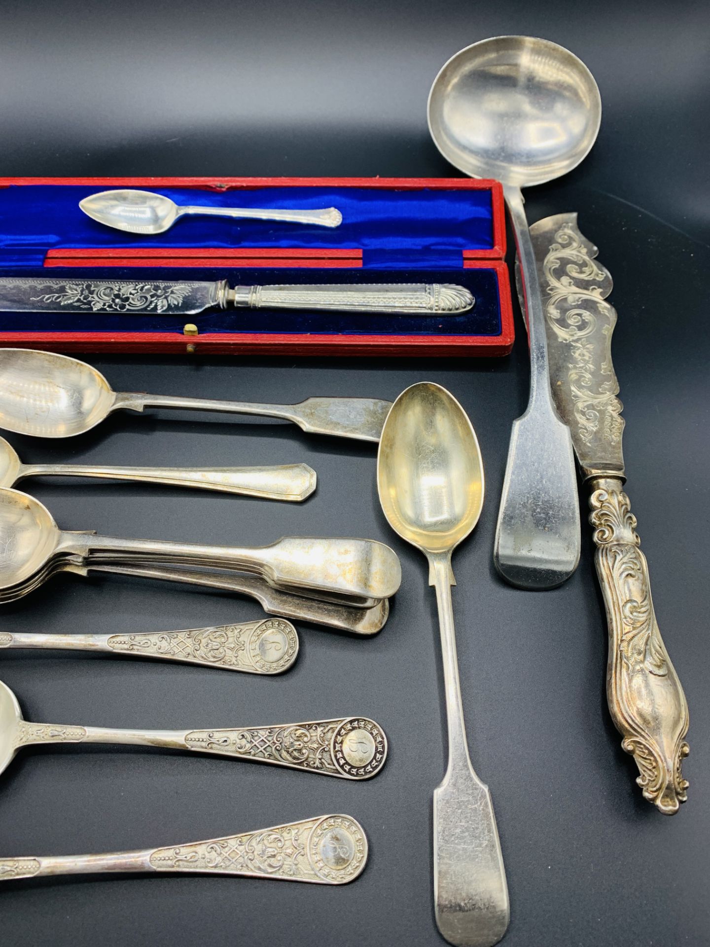 A collection of silver plate cutlery and a bronzed metal candle snuffer. - Image 3 of 5