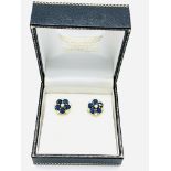 A pair of 18ct gold, sapphire and diamond floral set earrings
