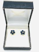 A pair of 18ct gold, sapphire and diamond floral set earrings