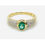 18ct gold emerald and diamond ring