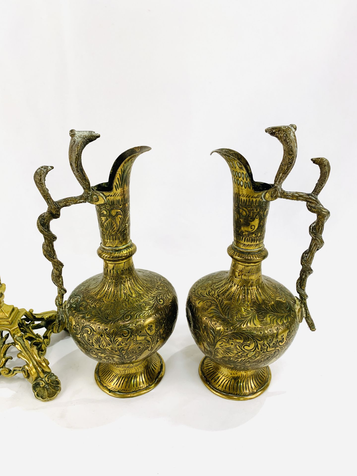 Pair of brass figural candlesticks with two Indian brass ewers - Image 4 of 4