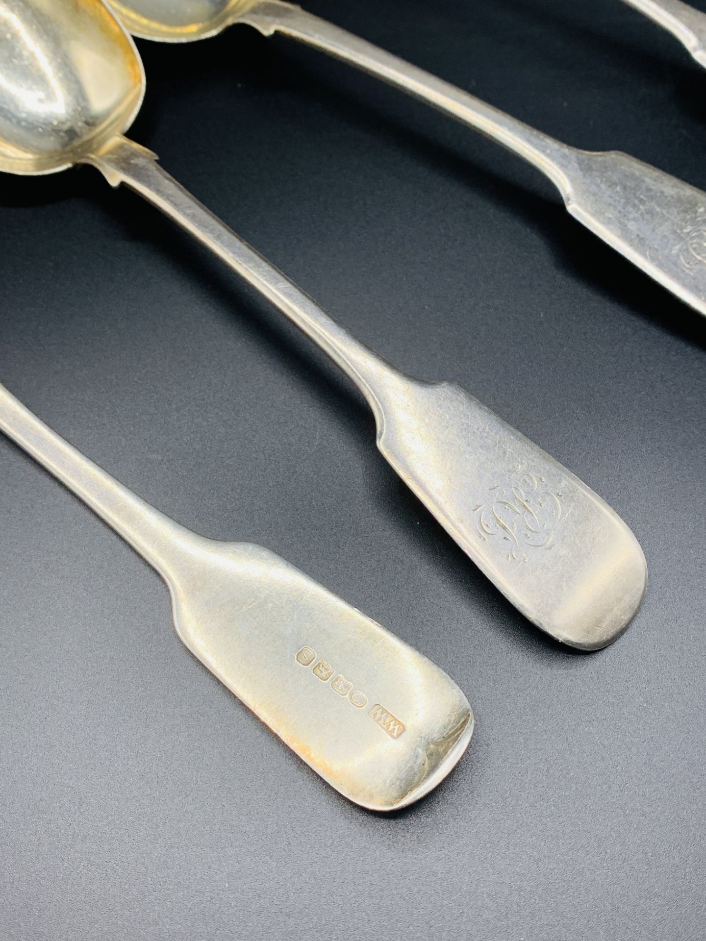 A pair of silver table spoons, a William IV silver table spoon, and a Georgian silver table spoon - Image 3 of 4