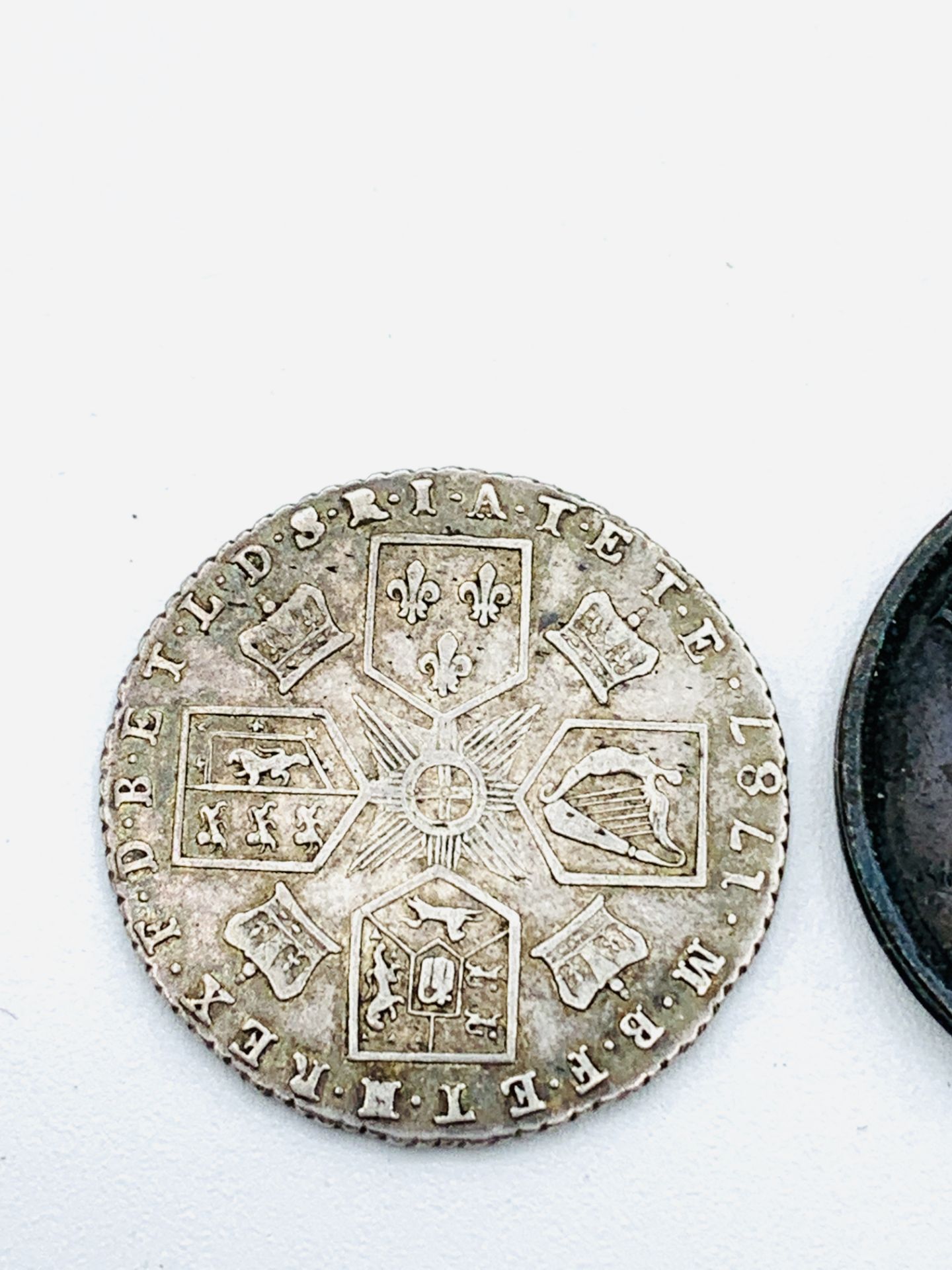 George III Silver Shilling 1787, a George III Silver Shilling 1817, and a George III penny 1806 - Image 4 of 6