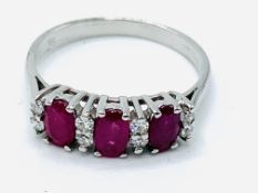 18ct white gold three stone ruby and diamond ring