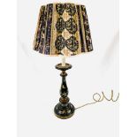 Black painted gilt decorated turned wooden table lamp with shade