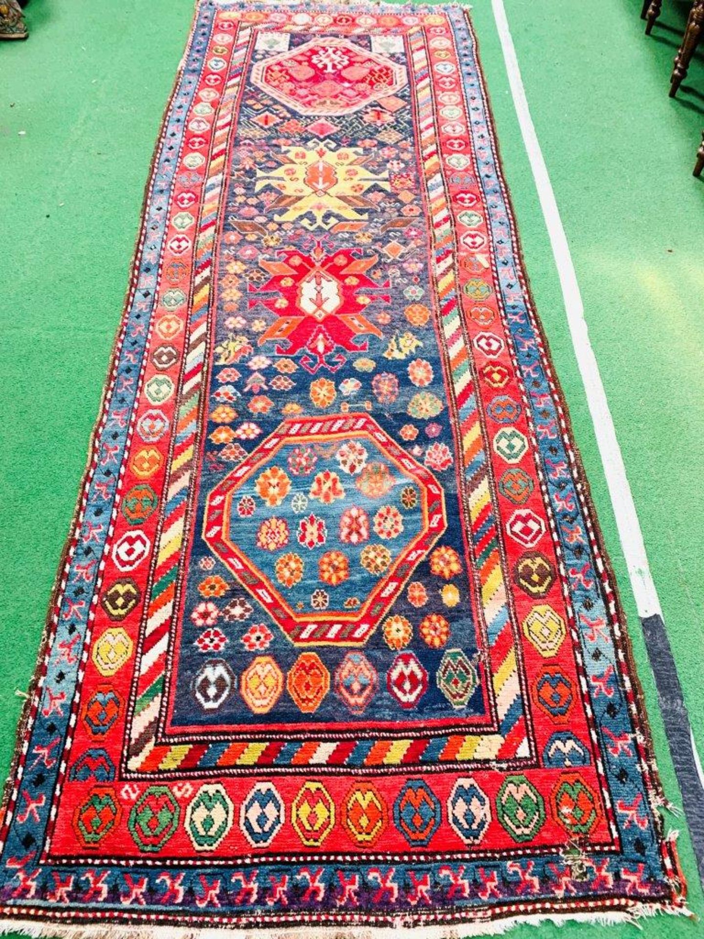Red and blue ground hand knotted Persian runner