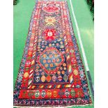 Red and blue ground hand knotted Persian runner