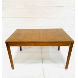 Teak extendable dining table