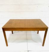 Teak extendable dining table