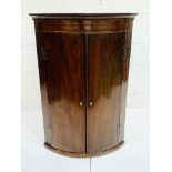 Georgian mahogany bow fronted wall mounted cabinet