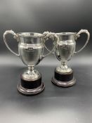 Two silver two-handled trophies