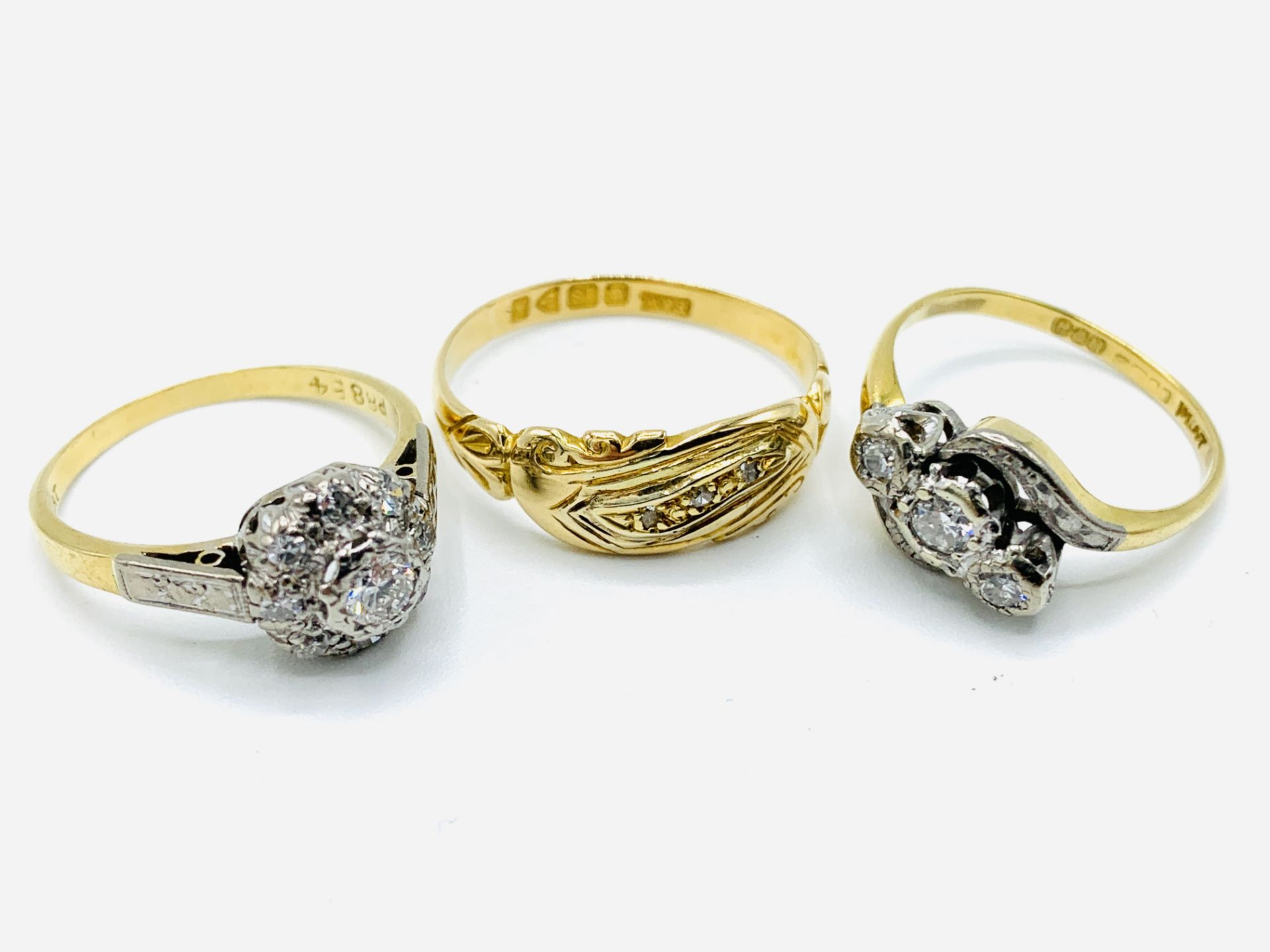 Two 18ct gold and platinum diamond rings and an 18ct gold ring - Image 2 of 5