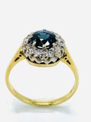 18ct gold, sapphire and diamond cluster ring