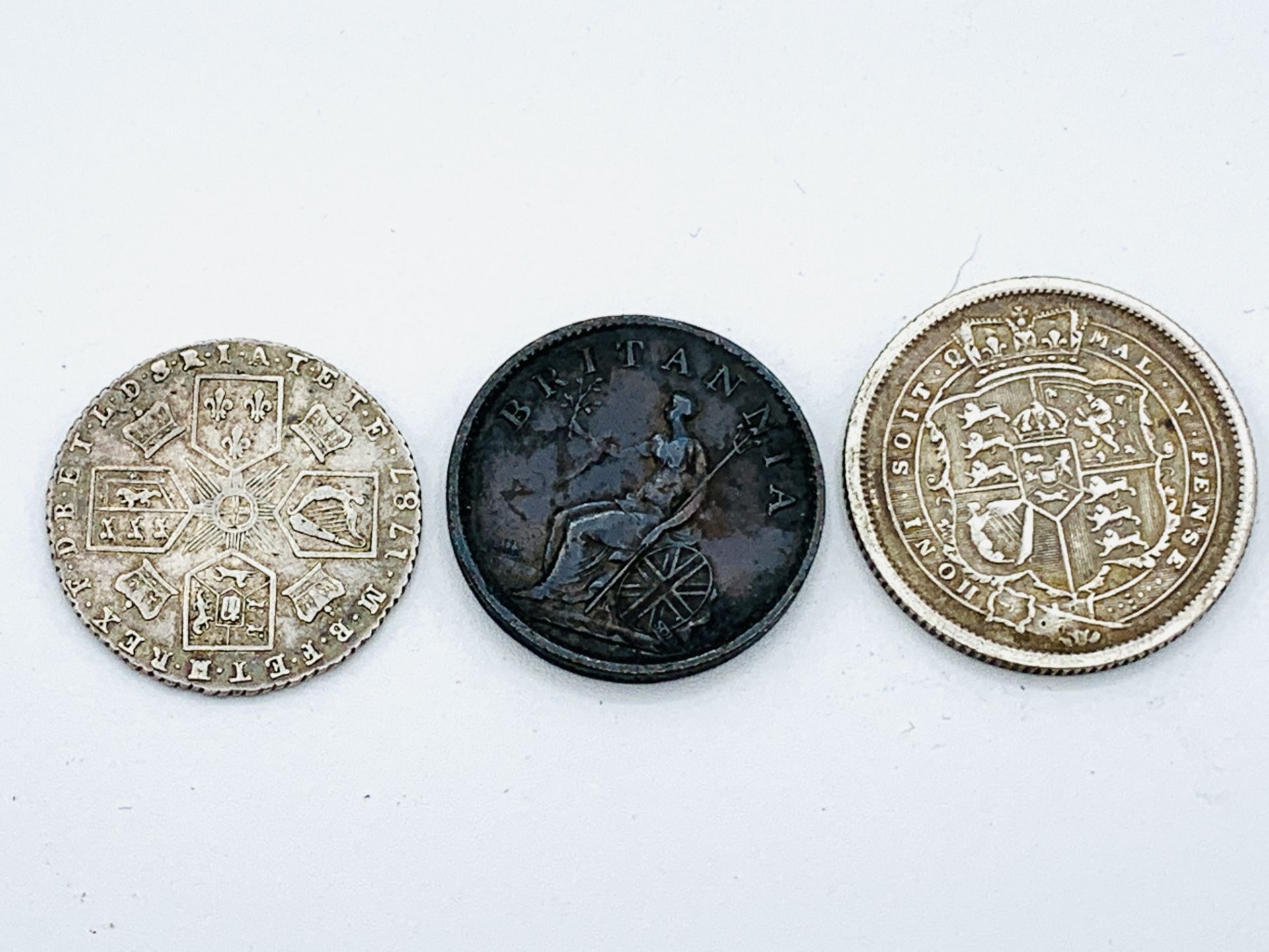 George III Silver Shilling 1787, a George III Silver Shilling 1817, and a George III penny 1806 - Image 3 of 6