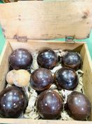 A set of eight antique Rosewood lawn bowls and two jacks