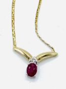 Ruby and diamond pendant on 10ct gold chain