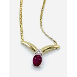 Ruby and diamond pendant on 10ct gold chain