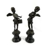Pair of signed bronze figurines of putti on speckled marble bases, signed Auguste Moreau.