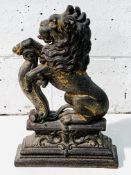 Cast iron doorstop in the form of a lion rampant