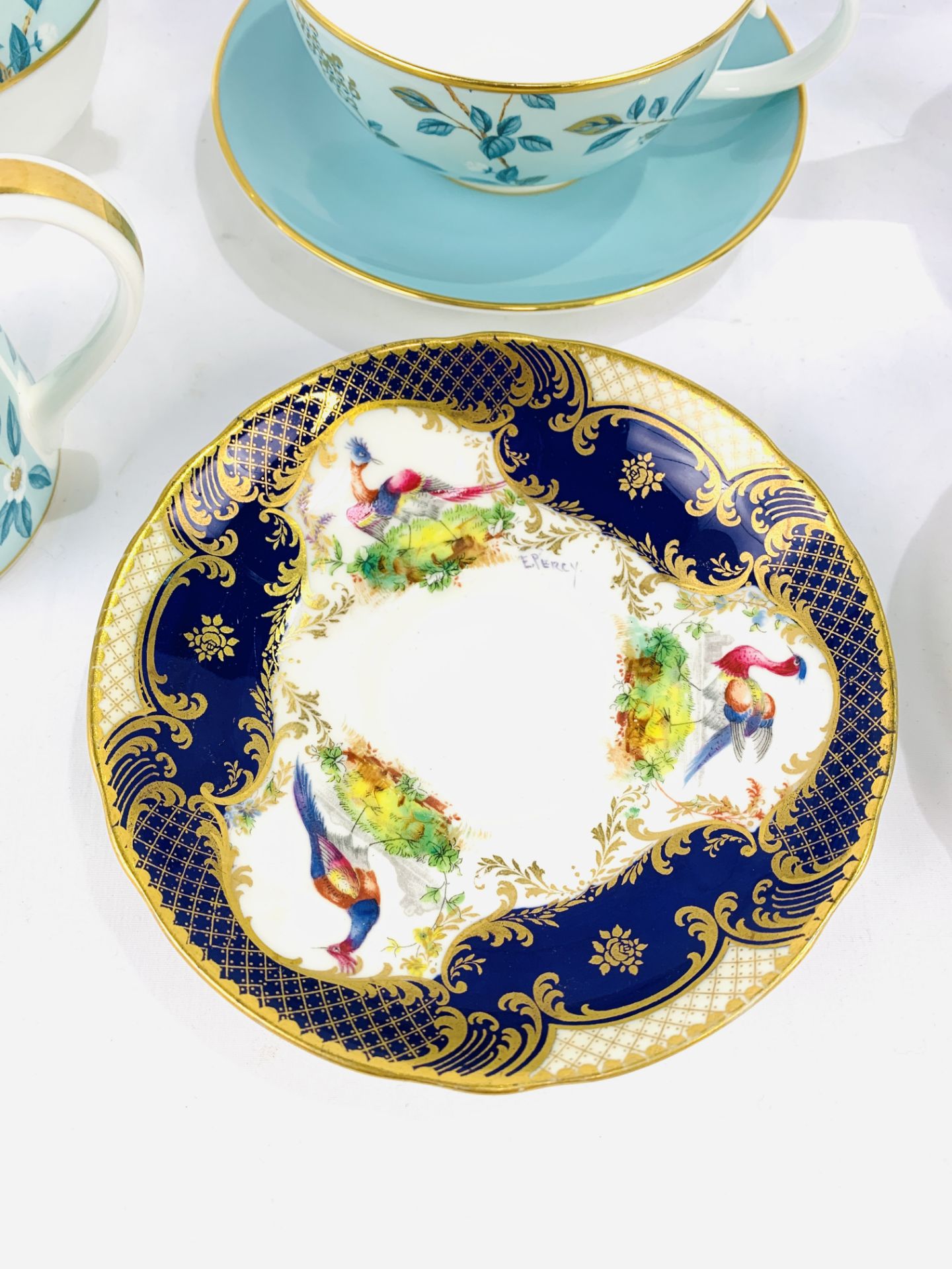 Two Royal Doulton blue and gilt decorated cups and saucers signed E Percy - Image 4 of 6