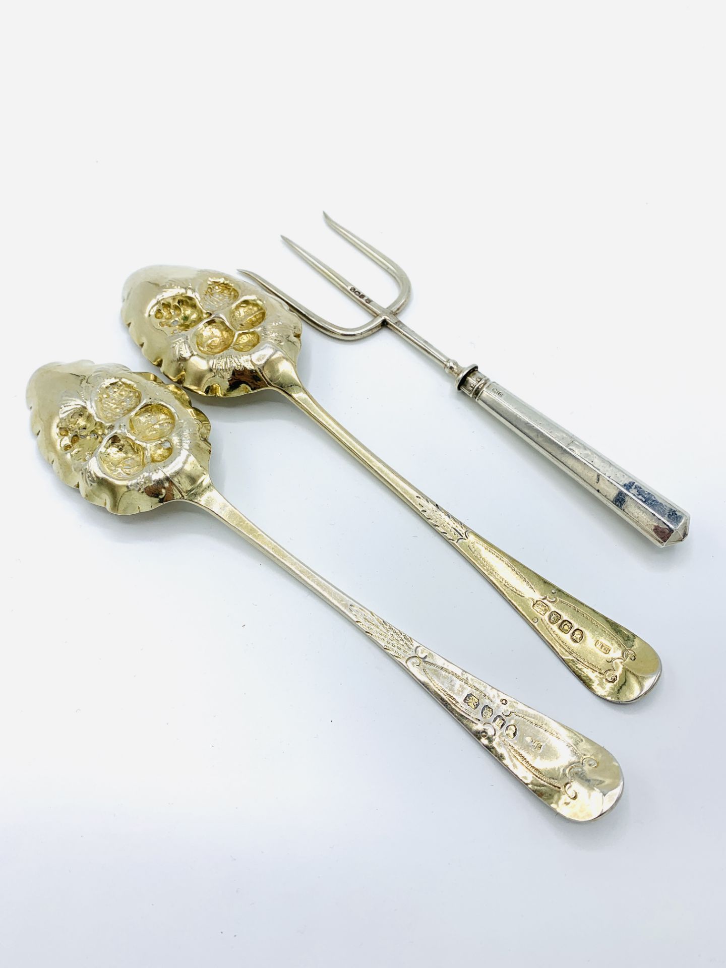 Two George III silver and gilt berry spoons and a silver 3 prong fork - Image 4 of 4
