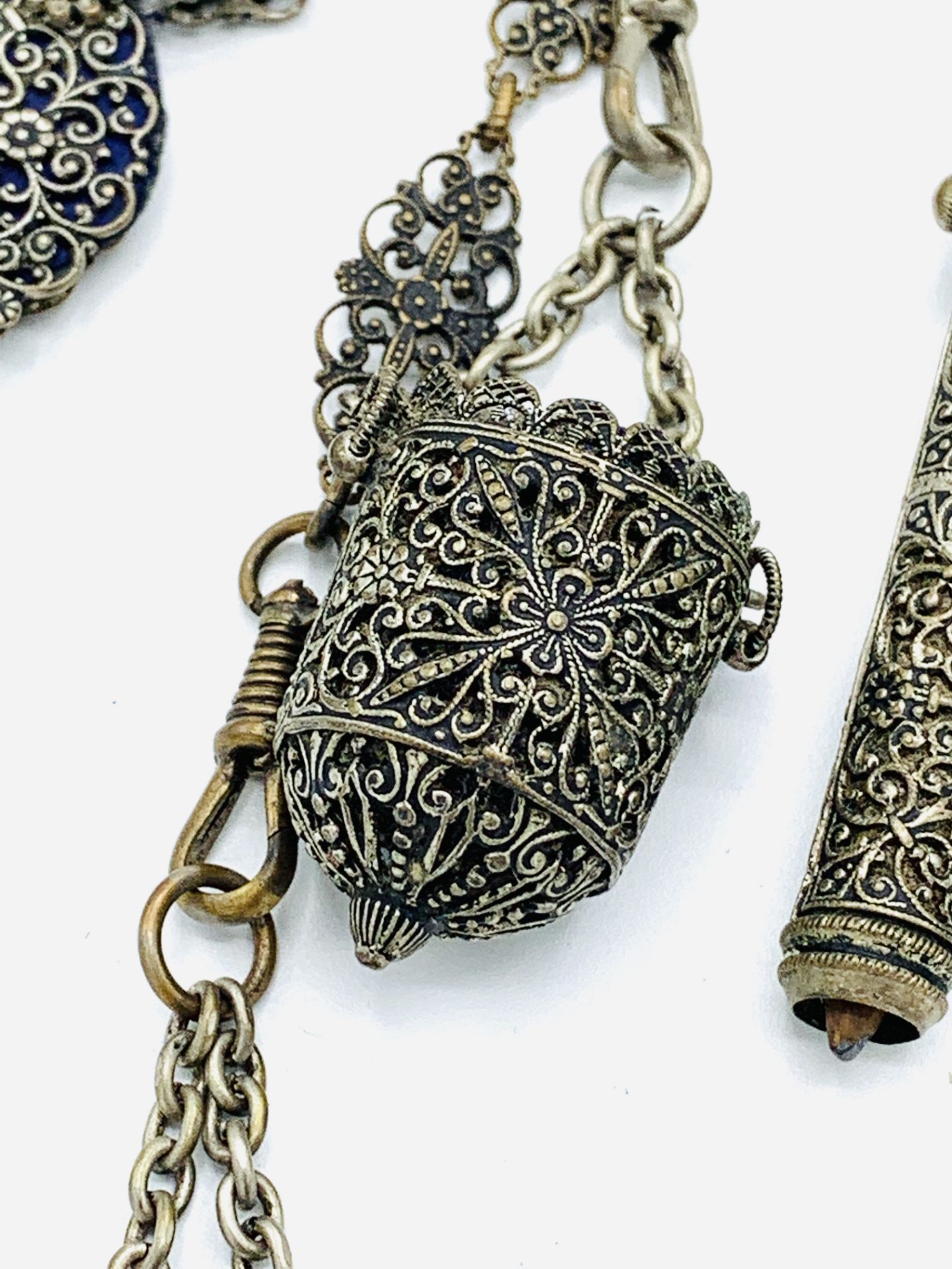 An ornately decorated Victorian white metal chatelaine - Image 3 of 6