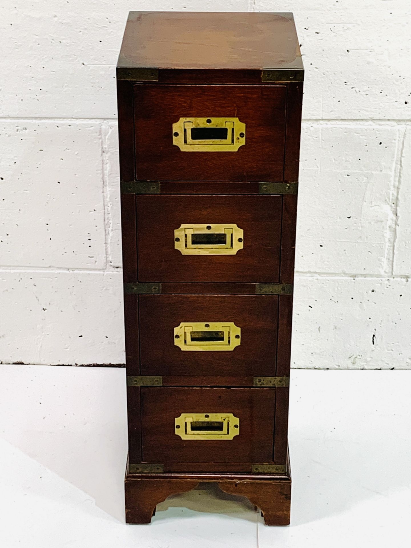 Brass bound mahogany small chest of four drawers