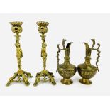 Pair of brass figural candlesticks with two Indian brass ewers