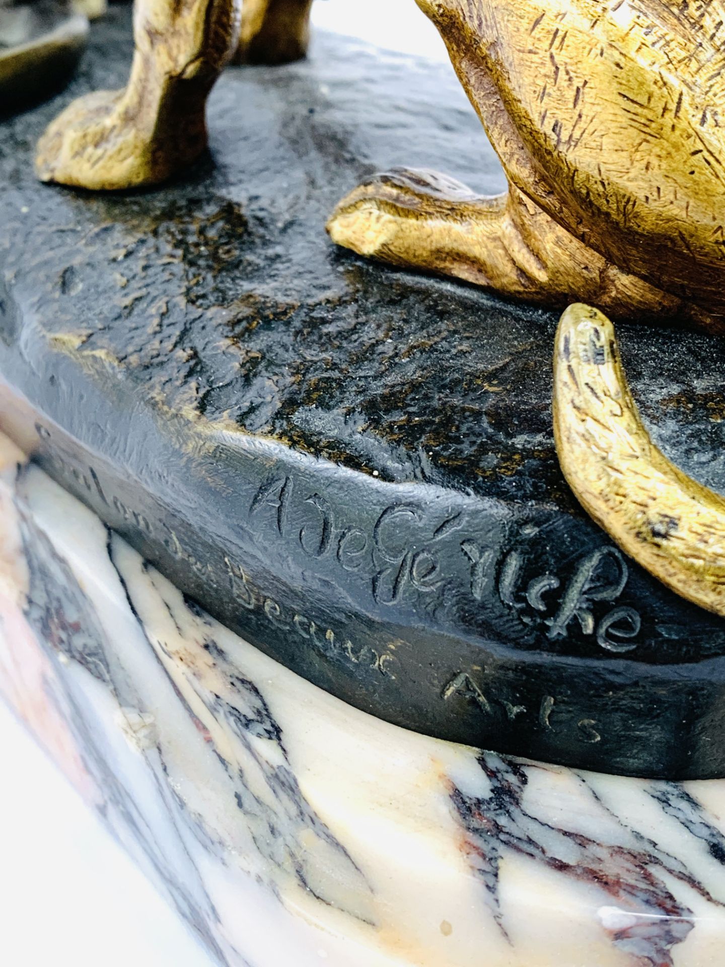 Brass/bronze figure of a dog sitting over a cat eating from a dish, signed A de Gericke - Image 3 of 5