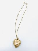 9ct gold heart shaped locket on a 9ct gold chain