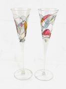 Two tall decorative glass flutes