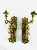 Pair of solid brass electric cherubic wall sconces complete with wooden mounts