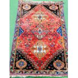 Red ground Quashgai Persian rug