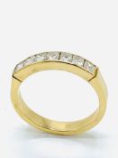 Gold and princess cut diamond half eternity ring