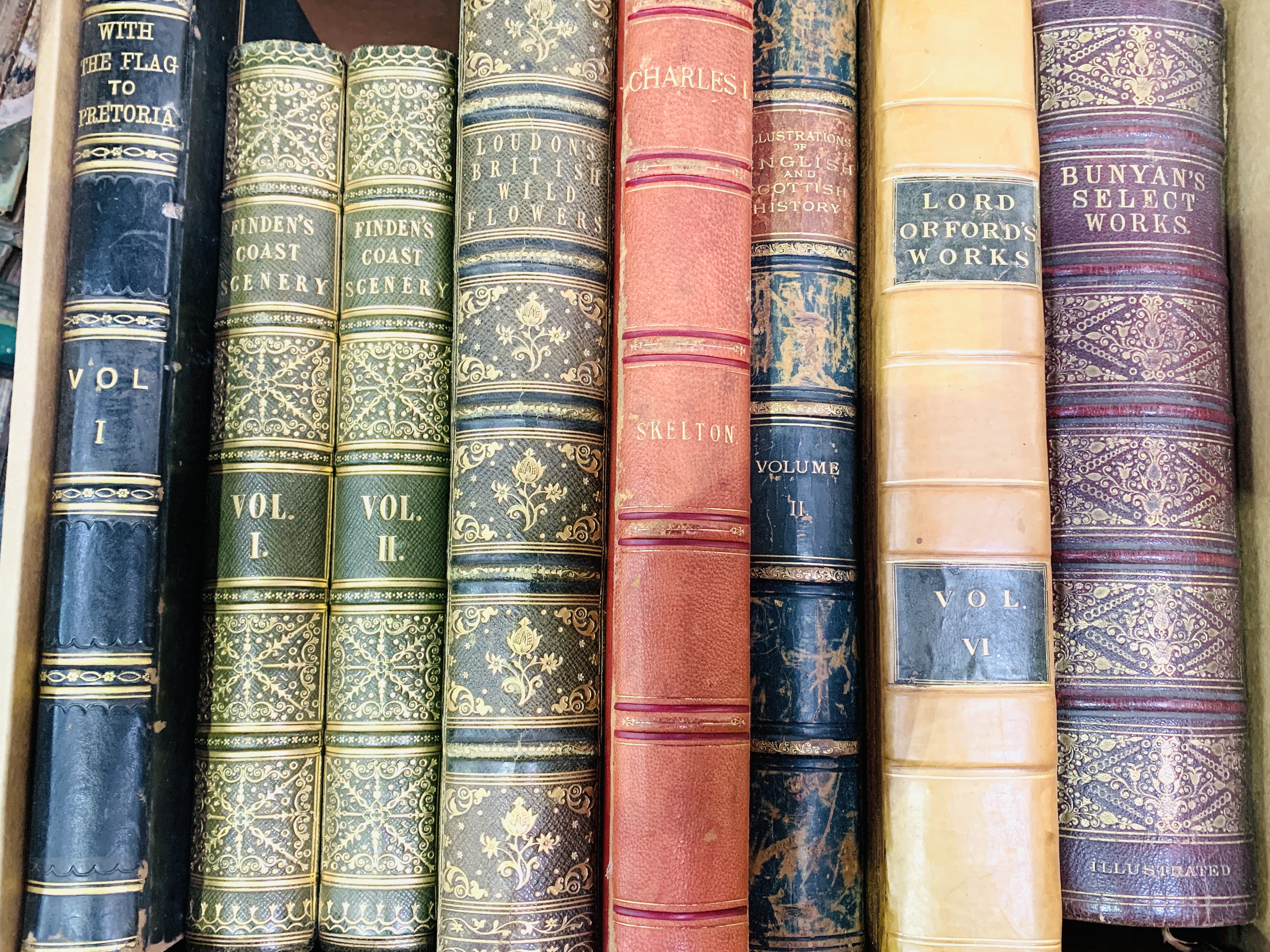 Eight quarto volumes with decorative bindings