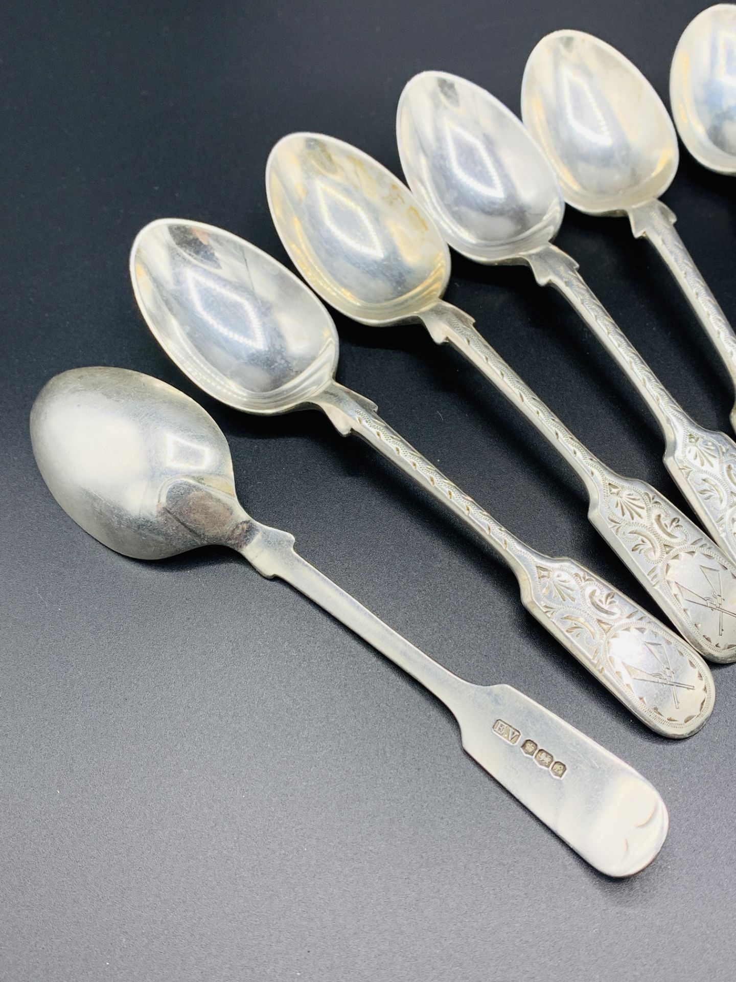 Six silver teaspoons with engraved decoration and crossed rifles to handles - Image 2 of 3