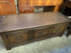 17th Century style oak blanket box with three carved panels