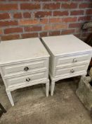 Three white painted two drawer bedside cabinets