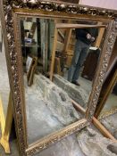 Decorative gilt framed bevelled edge wall mirror